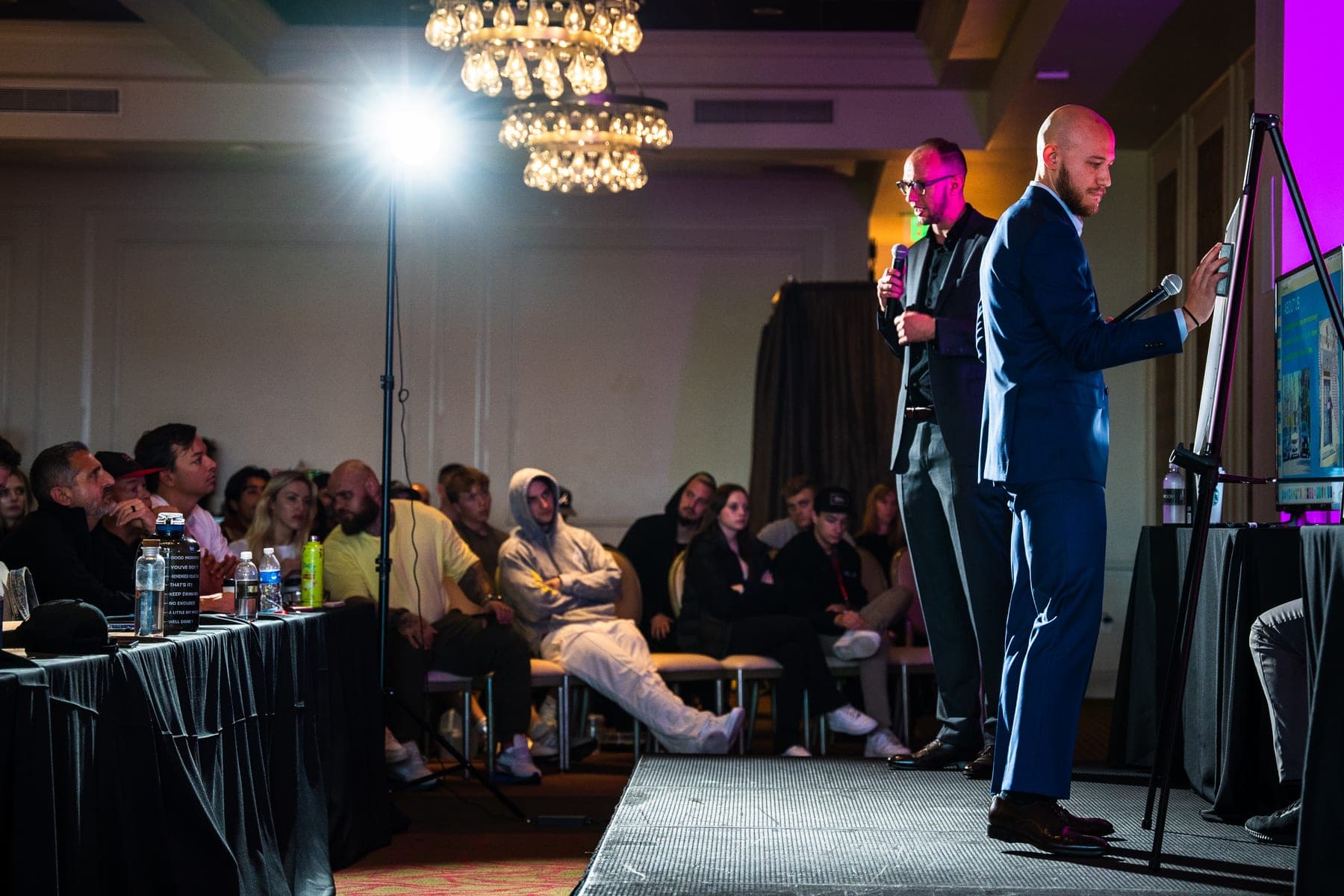 Josh and Chris Steil speaking on stage